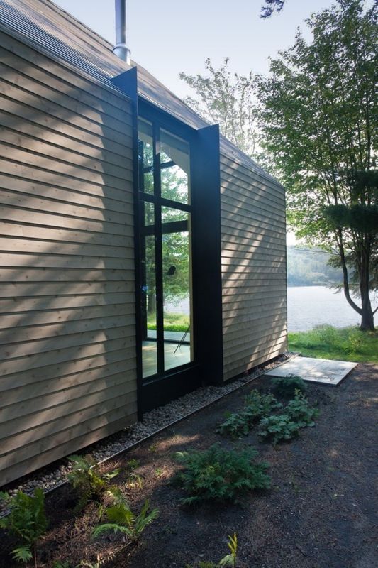 Fenêtre sur le Lac pour cette maison bois canadienne